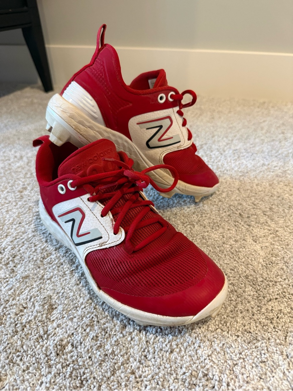 New Balance Kids' Red baseball cleats